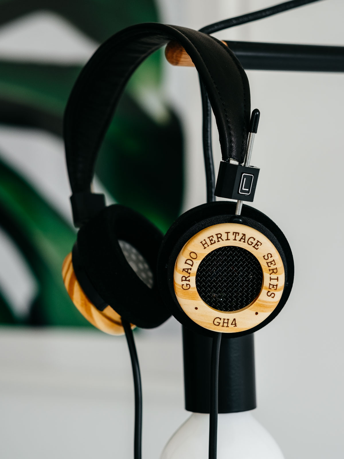 Photo of GH4 headphones with a plant in the background